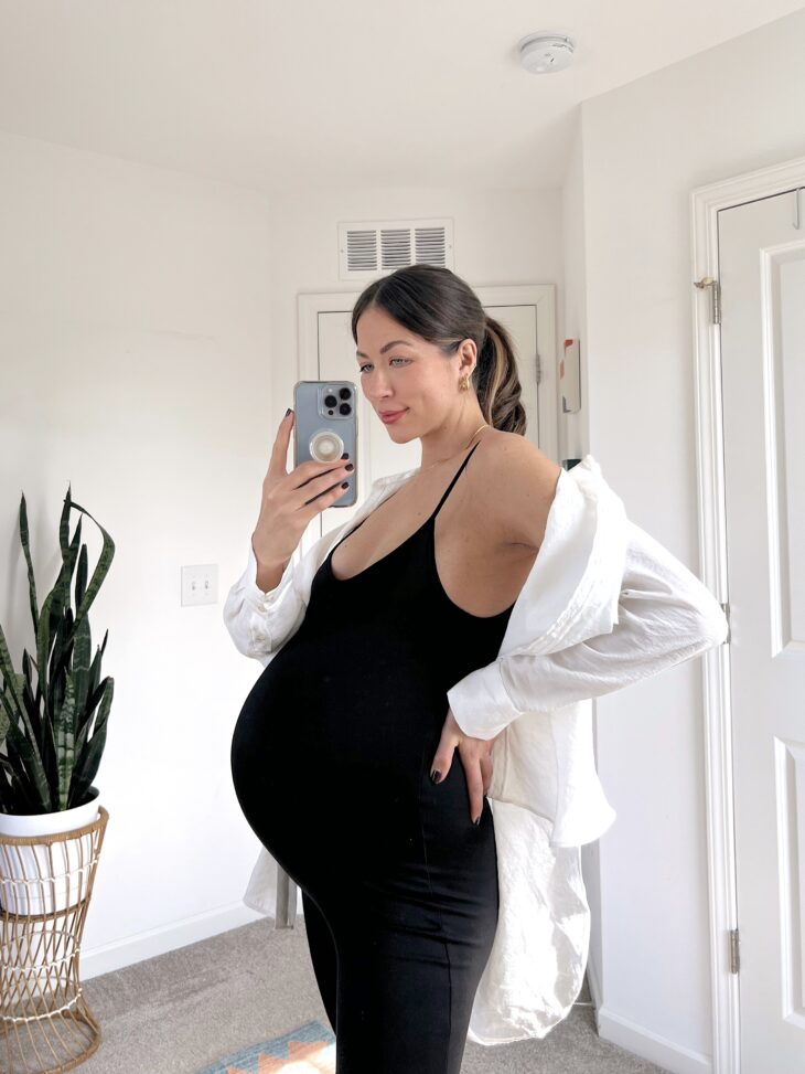 black jumpsuit maternity outfit